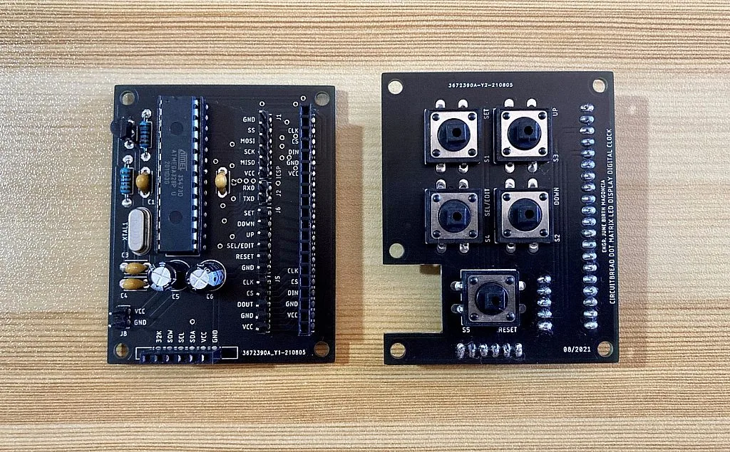 Bottom layer of the Digital Clock PCBs with the components soldered Bottom layer of the Digital Clock PCBs with the components soldered