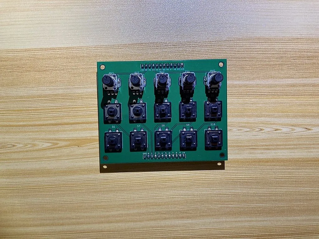 Knobs and Buttons soldered to the MIDI Controller Top PCB Knobs and Buttons soldered to the MIDI Controller Top PCB